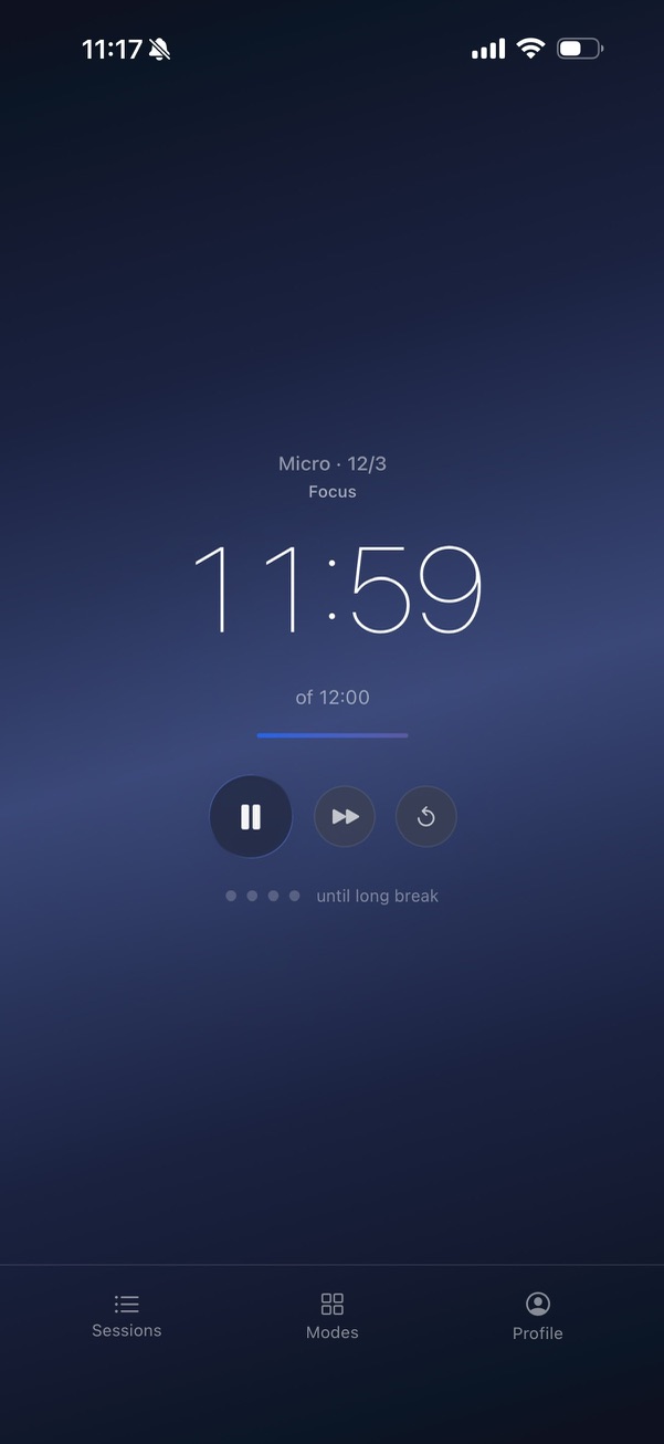 FloDoro iOS — Micro mode running at 11:59 of 12:00, deep navy gradient background, lightweight 200-weight numerals, gradient progress bar under the time. Pause / skip / reset are circular thumb-sized controls; the "until long break" pip row shows position in the cycle ::border